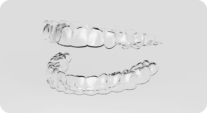 Invisalign clear aligner trays for the upper and lower teeth